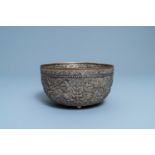 A hammered gilt silver tripod bowl, Thailand, 19/20th C.