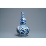 A Chinese blue and white double gourd vase, Transitional period