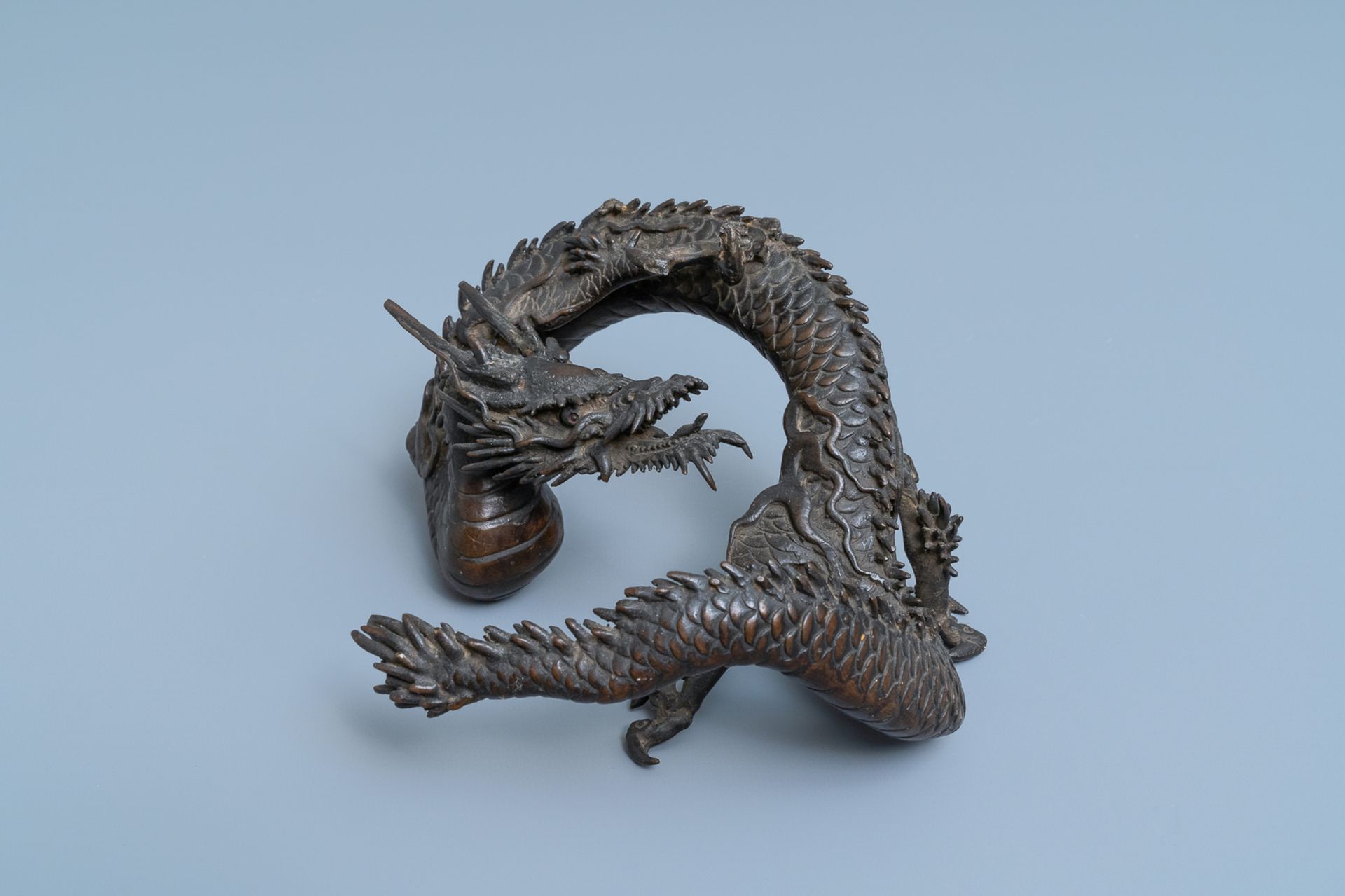 A Japanese bronze model of a dragon, Meiji, 19th C. - Image 6 of 7