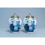 A pair of Dutch Delft blue and white tobacco jars with indians, 18th C.