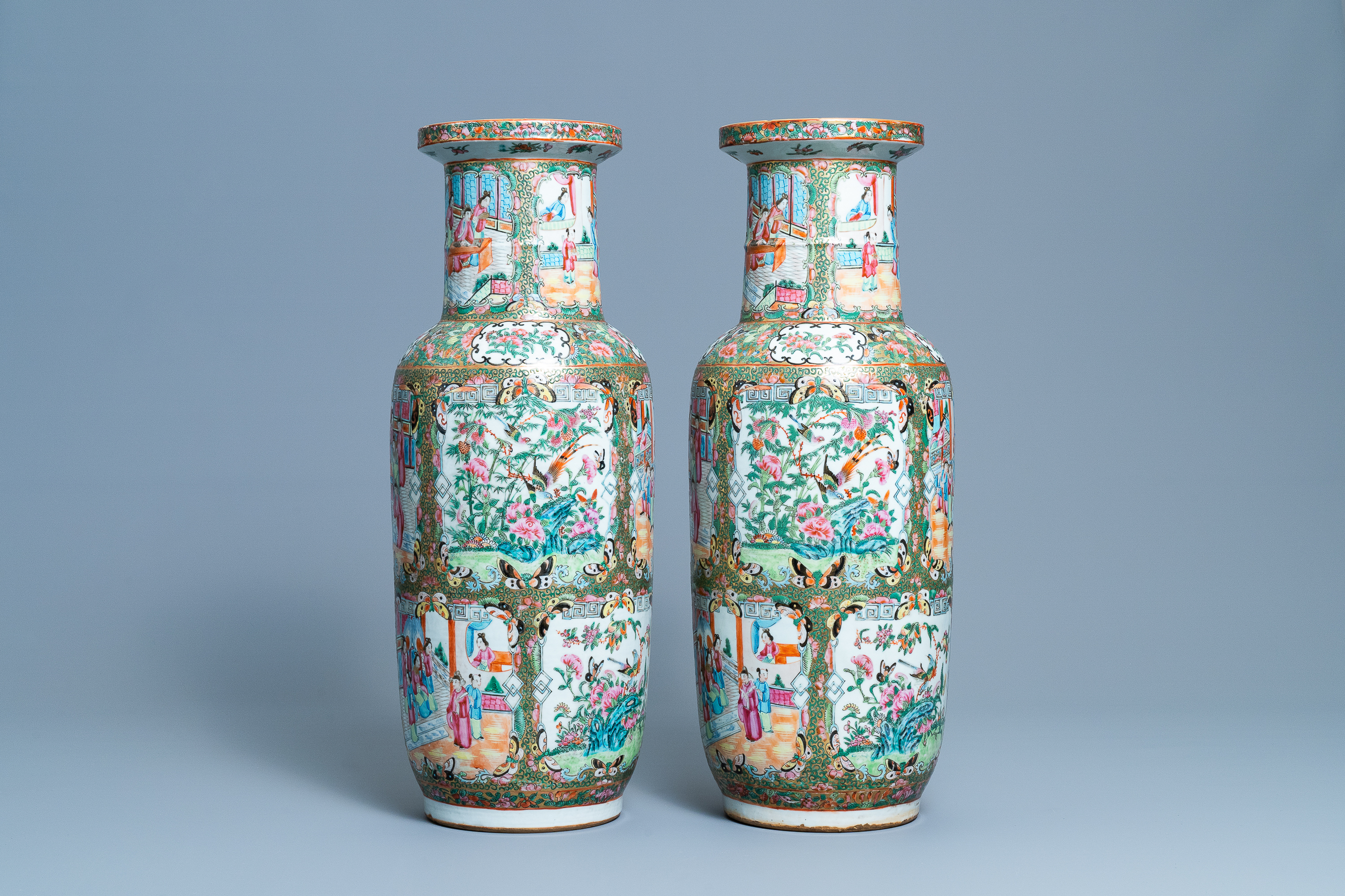 A pair of Chinese Canton famille rose rouleau vases, 19th C. - Image 4 of 6