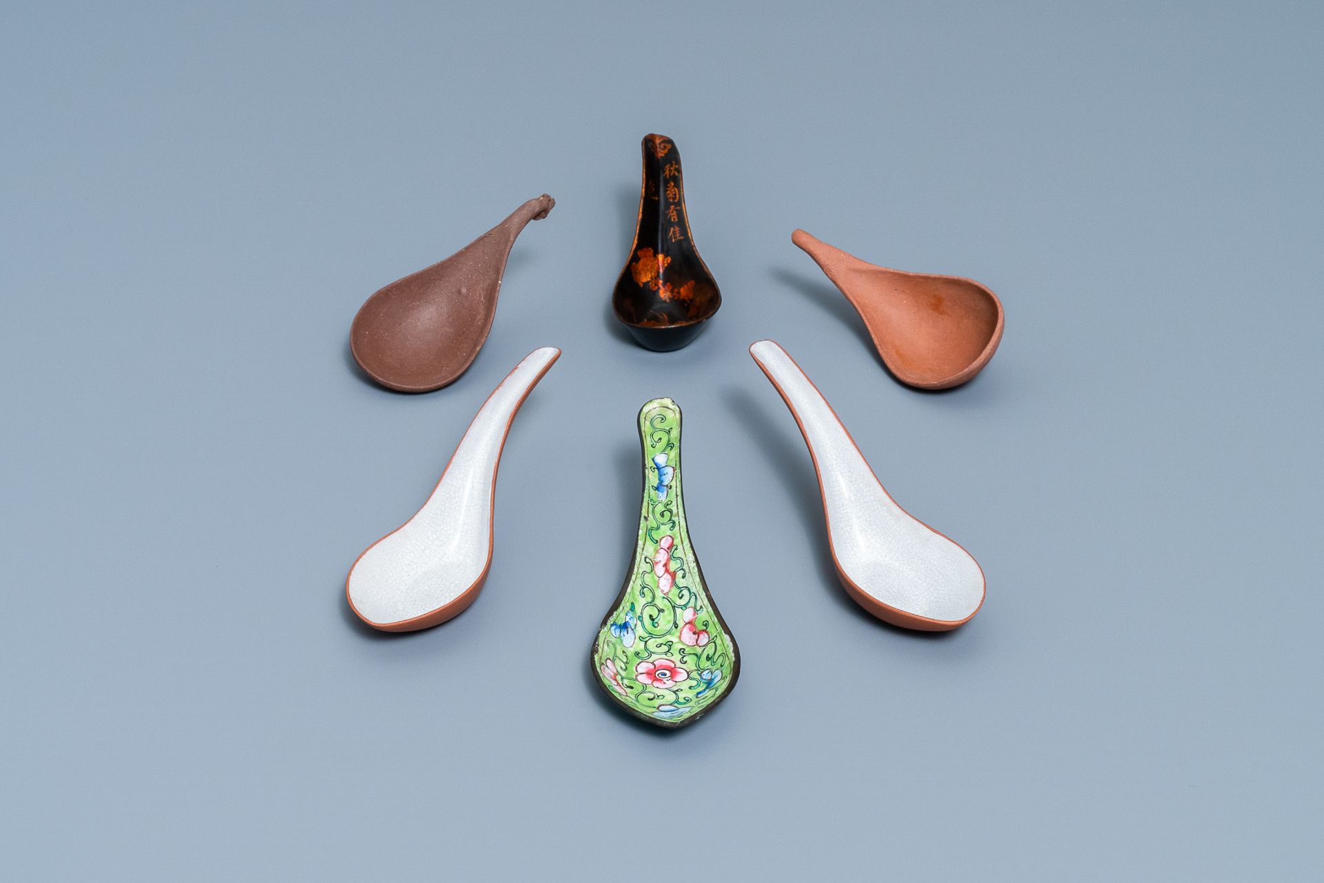 Six Chinese Yixing stoneware, lacquer and Canton enamel spoons, 19/20th C.