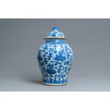 A large Chinese blue and white vase and cover with floral design, Kangxi