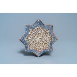 A star-shaped luster-glazed tile, Kashan, Iran, 14th C.