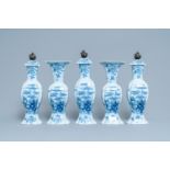 A Dutch Delft blue and white five-piece garniture with floral chinoiserie design, 18th C.