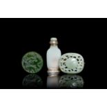 A Chinese white jade snuff bottle and two green jade carvings, 17th C. and later