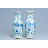 A pair ofÊ Chinese blue and white celadon-ground 'Immortals' vases, 19th C.