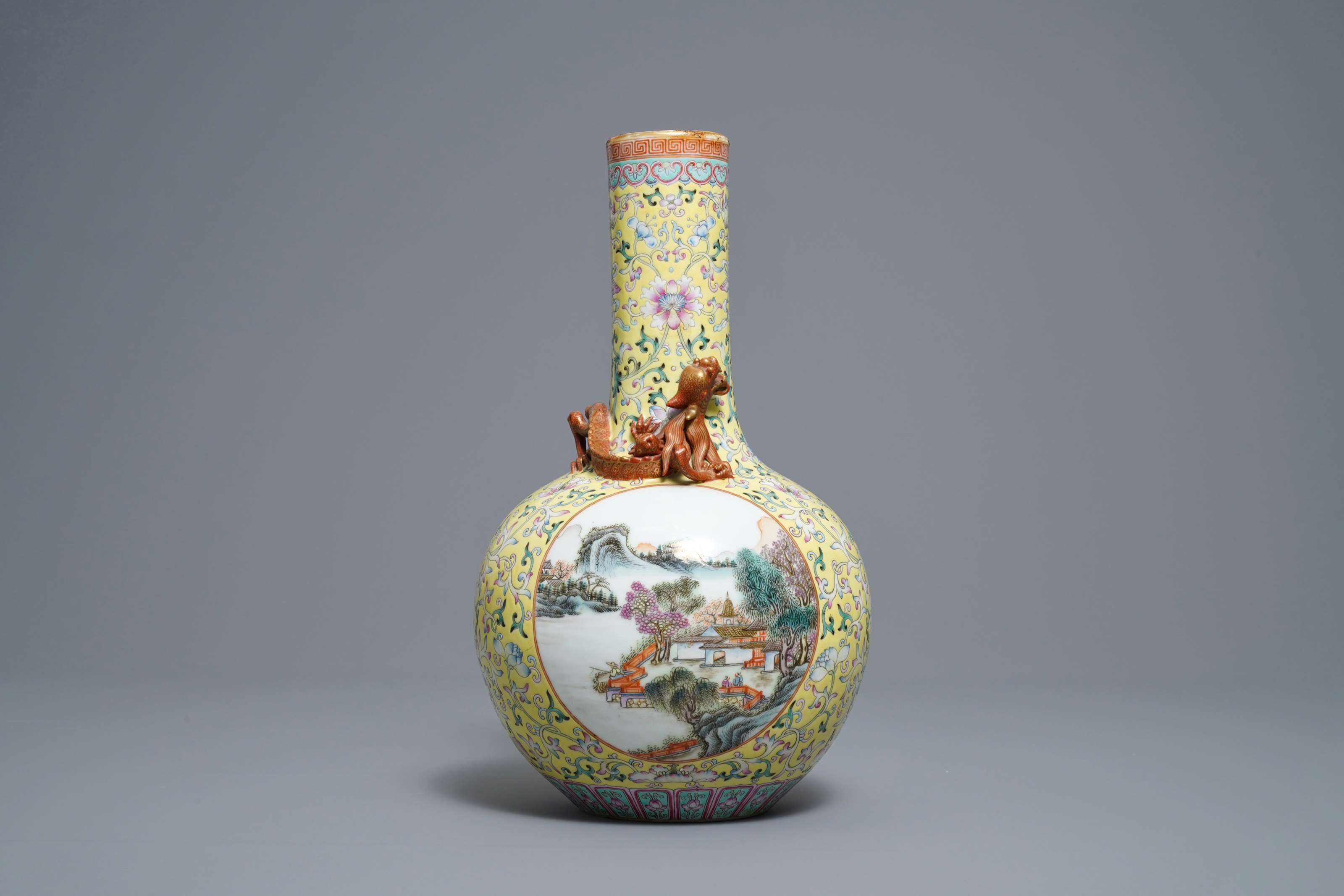 A Chinese famille rose bottle vase with landscape medallions, Qianlong mark, Republic