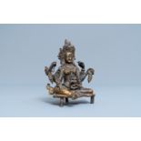 A Nepalese solid bronze figure of Vasudhara, 19th C.