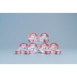 Six Chinese famille rose cups and saucers with a lady and a boy, Yongzheng/Qianlong