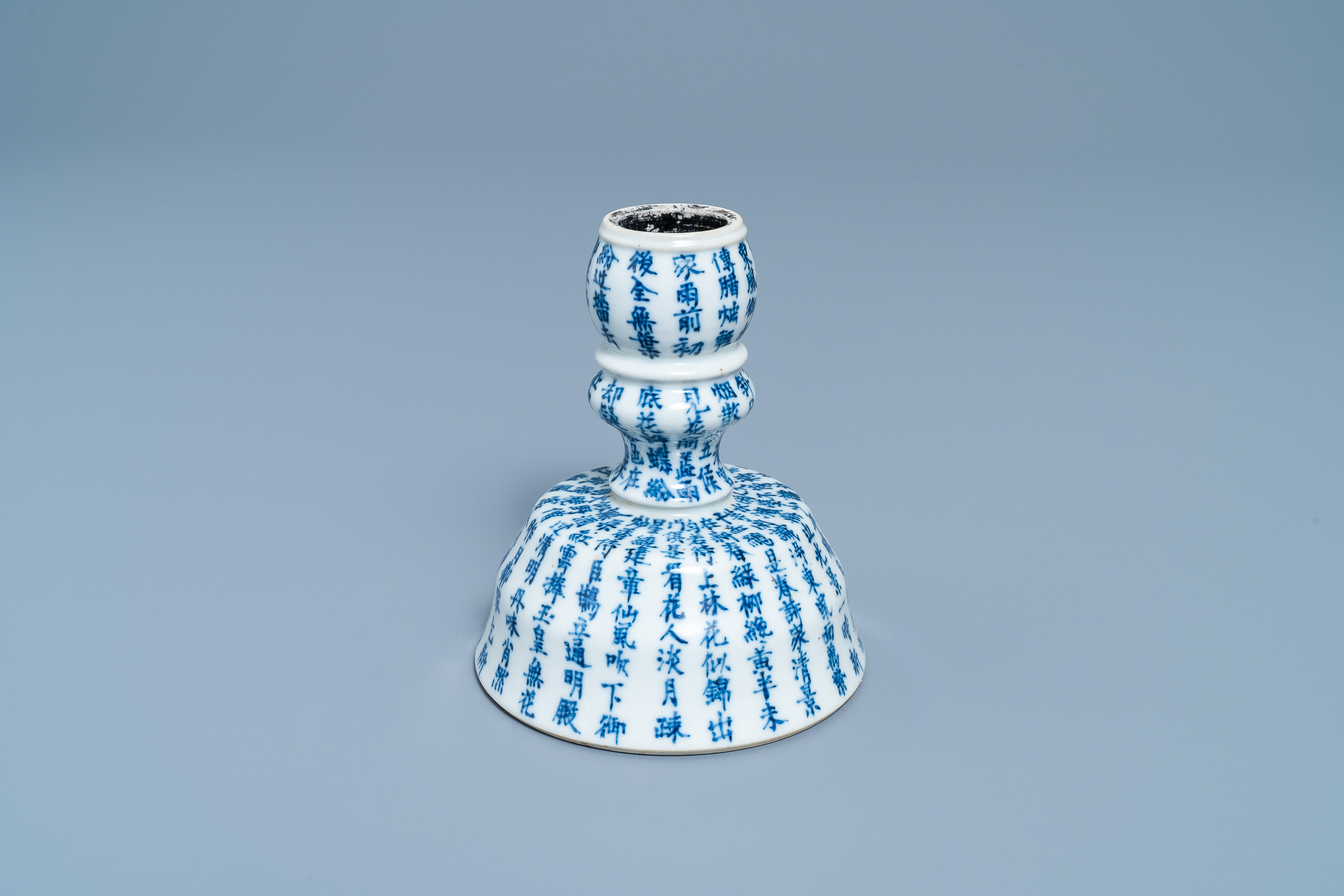 A Chinese blue and white Vietnamese market 'Bleu de Hue' candlestick, 19th C.