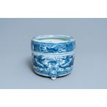 A Chinese blue and white 'dragon' tripod censer, Ming