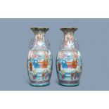 A pair of large Chinese famille rose 'court scene' vases, 19th C.