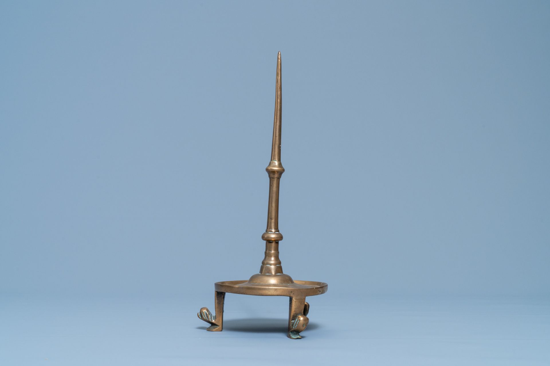 A Flemish or Dutch bronze candlestick, 14/15th C. - Image 5 of 7