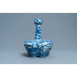 A Chinese blue and white tulip vase with antiquities, 19th C