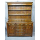 QUALITY REPRODUCTION OAK NORTH WALES TYPE DRESSER having a three shelf rack with seven spice drawers