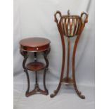REPRODUCTION MAHOGANY TWO-TIER HALL TABLE and a jardiniere stand, both having bird decoration, 87