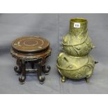 ORIENTAL BRONZE DOUBLE GOURD VASE on carved hardwood stand, high relief surrounding vine against