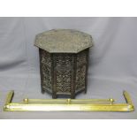 EASTERN CARVED HARDWOOD FOLDING TABLE, octagonal top with leaf and berry detail, repeated to the