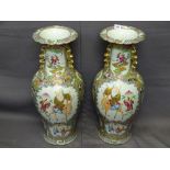 LATE 19TH/EARLY 20TH CENTURY CHINESE CANTON VASES, a large pair decorated Famille Rose palette