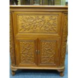 ORIENTAL CARVED HARDWOOD COCKTAIL CABINET, various cupboards incorporated with lift lid and drop-