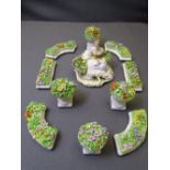 LUIGI FABRIS ITALIAN PORCELAIN DISPLAY SET, 11 piece consisting of central seated girl holding
