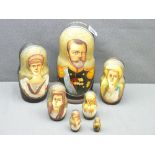 HAND PAINTED RUSSIAN NESTING DOLLS, set of seven, depicting Tsar Nicholas II and his family