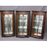 THREE REPRODUCTION MAHOGANY WALL HANGING CORNER DISPLAY CABINETS, cut glass single doors and