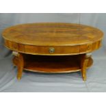 REPRODUCTION MAHOGANY OVAL CENTRE/COFFEE TABLE with central drawer and under-tier shelf, 51.5cms