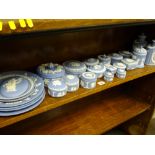 WEDGWOOD BLUE JASPERWARE, 25 pieces including a pair of lidded tea canisters, an oval plaque,