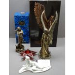TWO BOXED BRONZE EFFECT FIGURINES, Capodimonte reclining nude female and a ruby type glass star