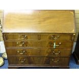 GEORGIAN MAHOGANY FALL-FRONT BUREAU, circa 1820, the well fitted interior with Sheraton type ovals