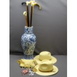 FLOOR STANDING ORIENTAL POTTERY BLUE & WHITE VASE and walking stick contents, two straw hats, Indian