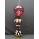 CAMEO CUT GLASS VICTORIAN OIL LAMP, brass with Bohemian type Ruby overlay, bulbous base and font