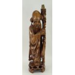 GOOD CARVED BOXWOOD FIGURE OF A CHINESE SCHOLAR standing beside a carved staff with stork and