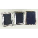 THREE SIMILAR SILVER PORTRAIT PHOTOGRAPH FRAMES of rectangular and similar size (3)