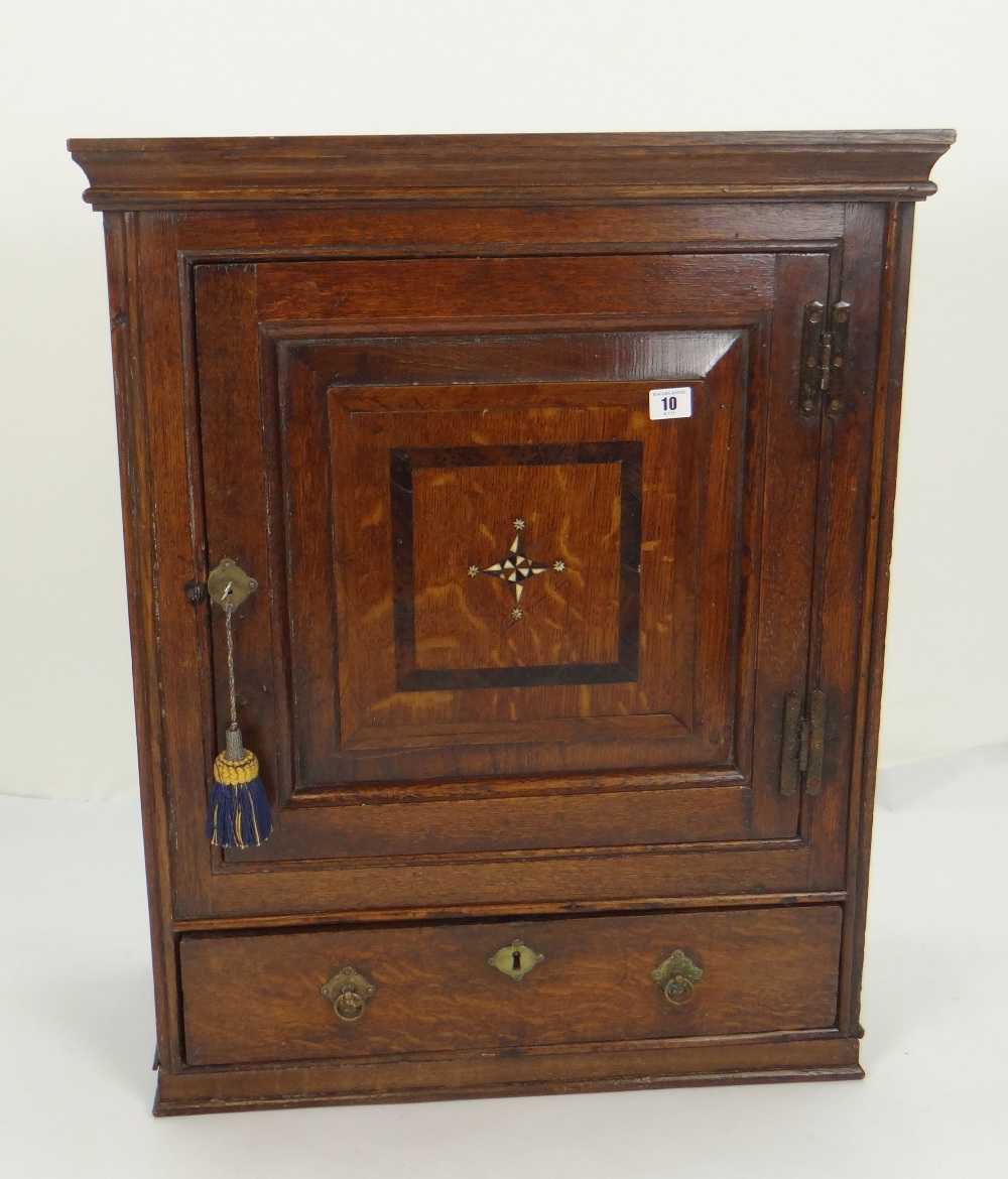 GOOD MID 18TH CENTURY JOINED OAK MURAL CUPBOARD, pediment above paneled door, with feather strung - Image 2 of 3