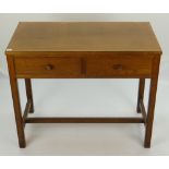 GORDON RUSSELL OAK RECTANGULAR TABLE fitted with two moulded edged frieze drawers, turned oak knobs,