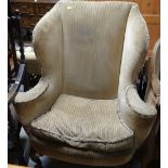 GOOD VINTAGE WINGBACK FIRESIDE CHAIR of shapely form with sweeping arms, on carved ball and claw