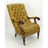 MUSTARD YELLOW LEATHER UPHOLSTERED MAHOGANY LIBRARY ARM CHAIR, button back and loose squab seat,