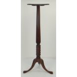 MAHOGANY TORCHERE with reeded column and wrythen twisted base, triple cabriole legs, 136cms high