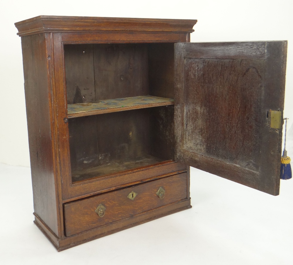 GOOD MID 18TH CENTURY JOINED OAK MURAL CUPBOARD, pediment above paneled door, with feather strung - Image 3 of 3