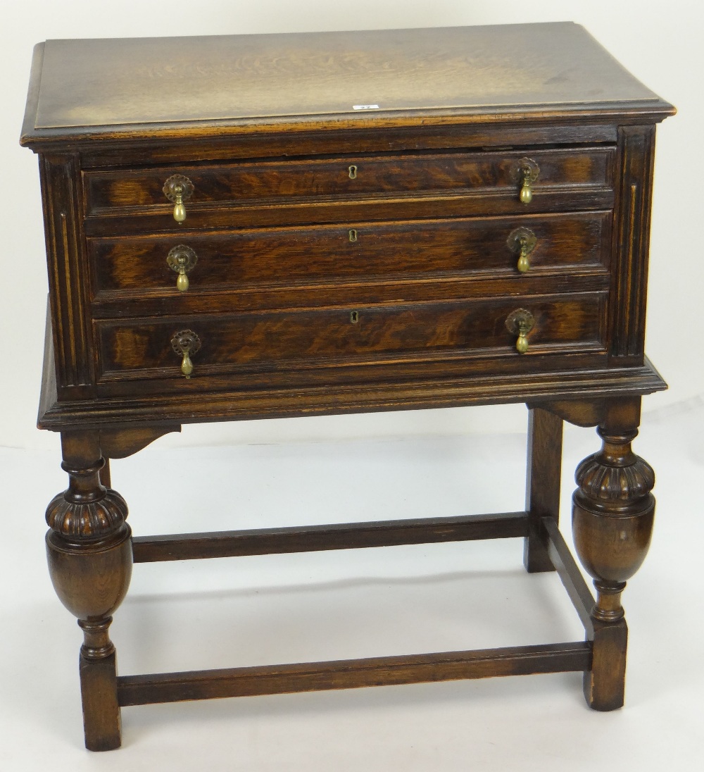 VINTAGE OAK THREE DRAWER STANDING CUTLERY CABINET & CONTENTS, incomplete, Elkington silver plate