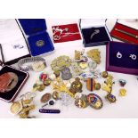 ASSORTED METAL & ENAMEL BADGES including military and railway items, and a wristwatch by Accurist