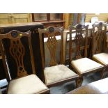 SET OF FOUR CARVED DINING CHAIRS with high Chippendale style splat backs