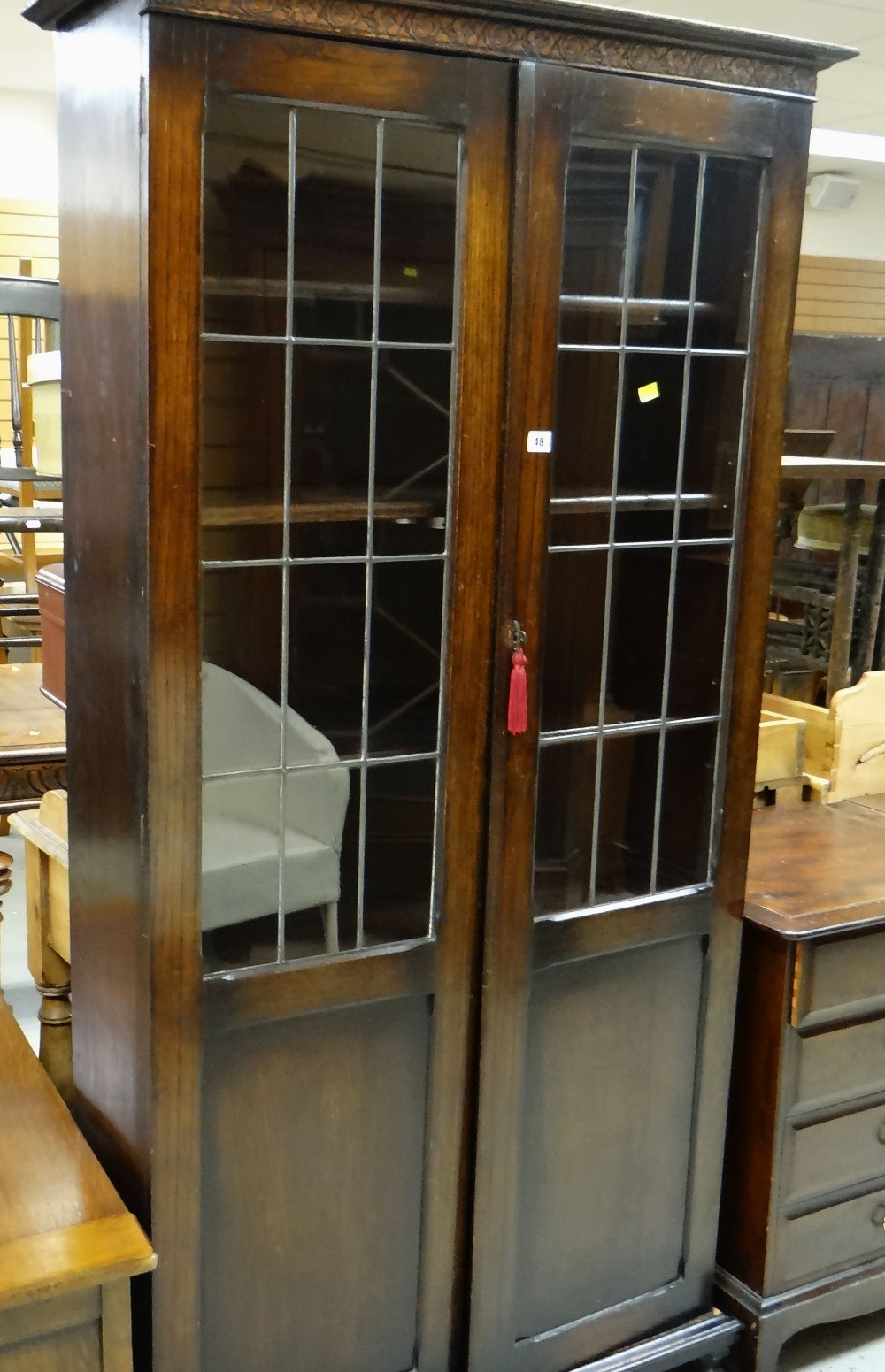 VINTAGE CARVED TWO DOOR GLAZED BOOKCASE, 91cms wide