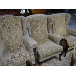 THREE PARER KNOLL WING-BACK FIRESIDE ARMCHAIRS in various floral upholstery