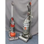TWO DYSON UPRIGHT VACUUM CLEANERS E/T