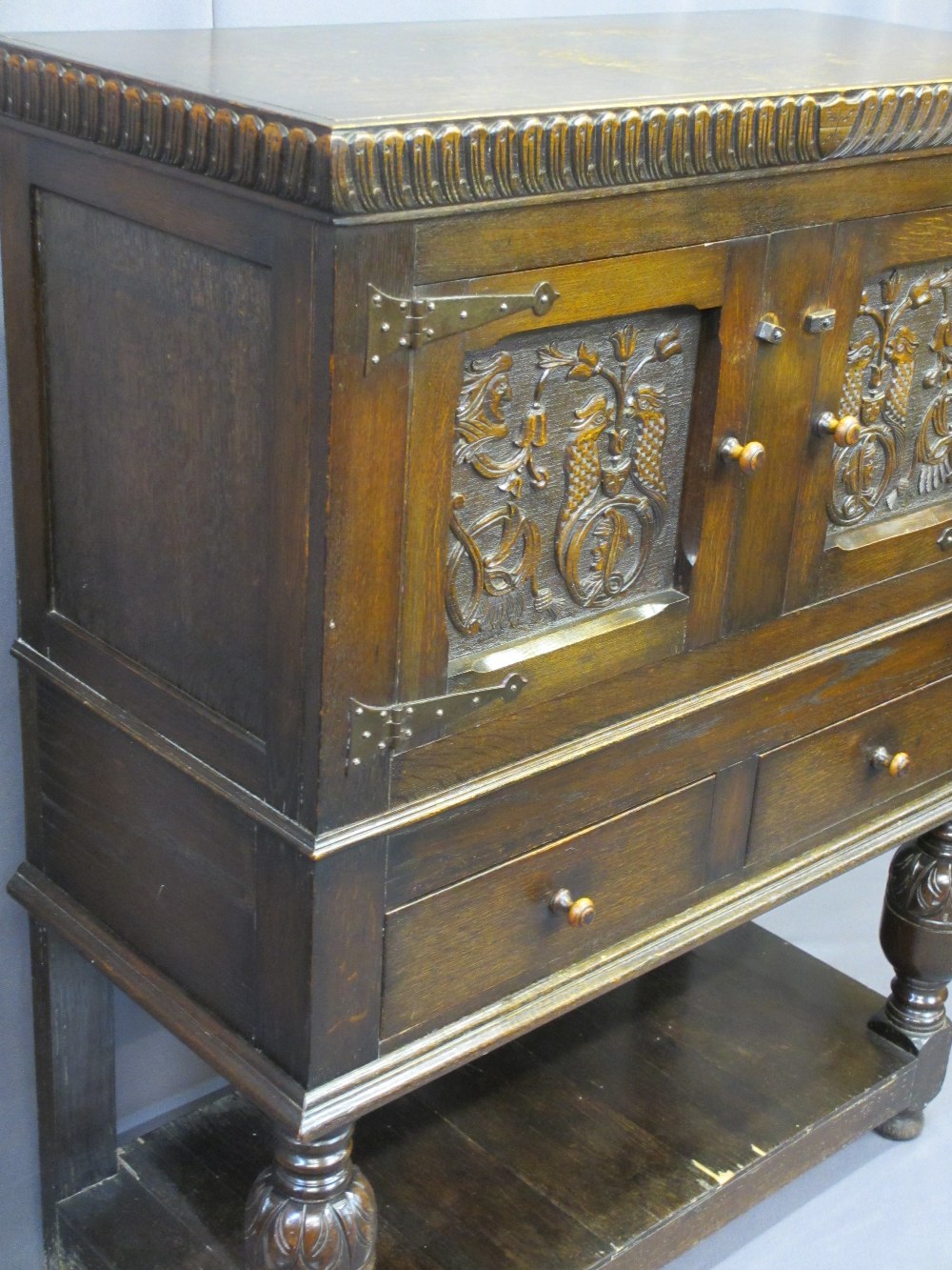 VINTAGE CONTINENTAL CARVED OAK BUFFET SIDEBOARD having twin upper doors with bird and mask detail - Image 2 of 4