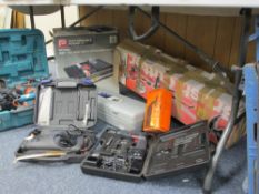 CASED POWER & BENCH TOOLS, a quantity with a boxed petrol brushcutter and a folding workbench, E/T